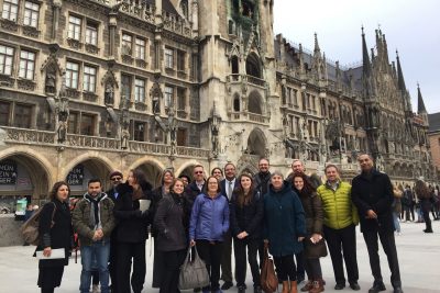 Virginia Tech faculty and staff stand in front of a building in Munich, Germany