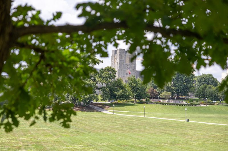 View of Burruss Hall from across the grassy Drillfield