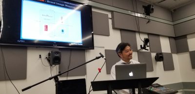 Myounghoon Jeon presenting From Kitchen to Aquarium: The Spectrum of Sonification across Information, Expression, Immersion during Session I talks
